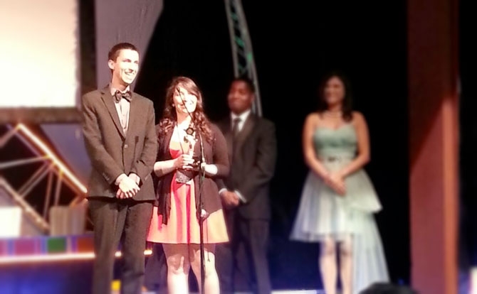 Students Erin Pierce and Phillip Sandoval accepting award for the film “Fairytale”