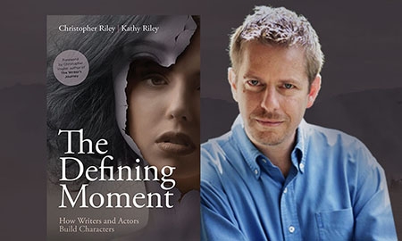 Chris Riley with The Defining Moment Book