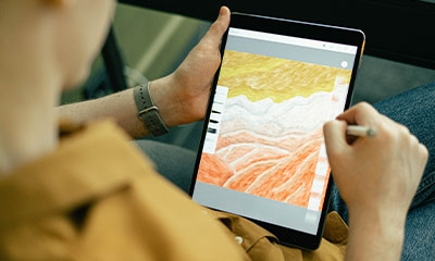Student Drawing on Tablet